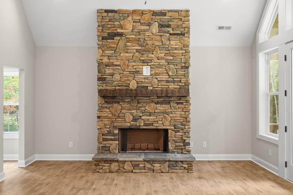 10 West Hawks Nest Road Blairsville, GA 30512 - Photo 36 of 40 an empty room with a fireplace