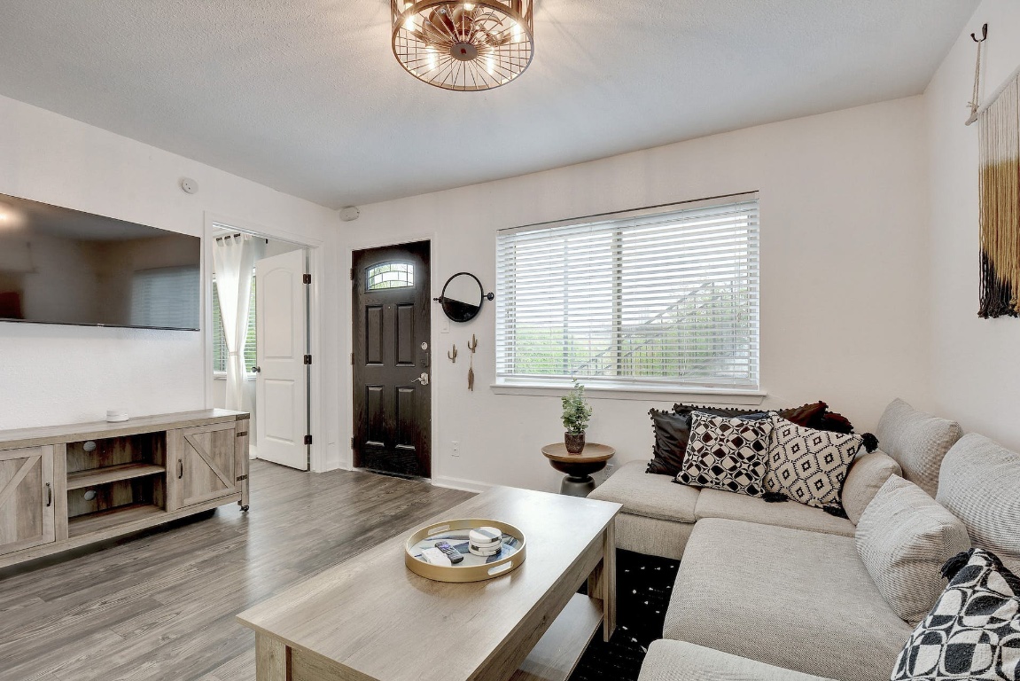 1202 Newning Avenue, Unit 202 Austin, TX 78704 - Photo 8 of 20 Living room with light wood finished floors