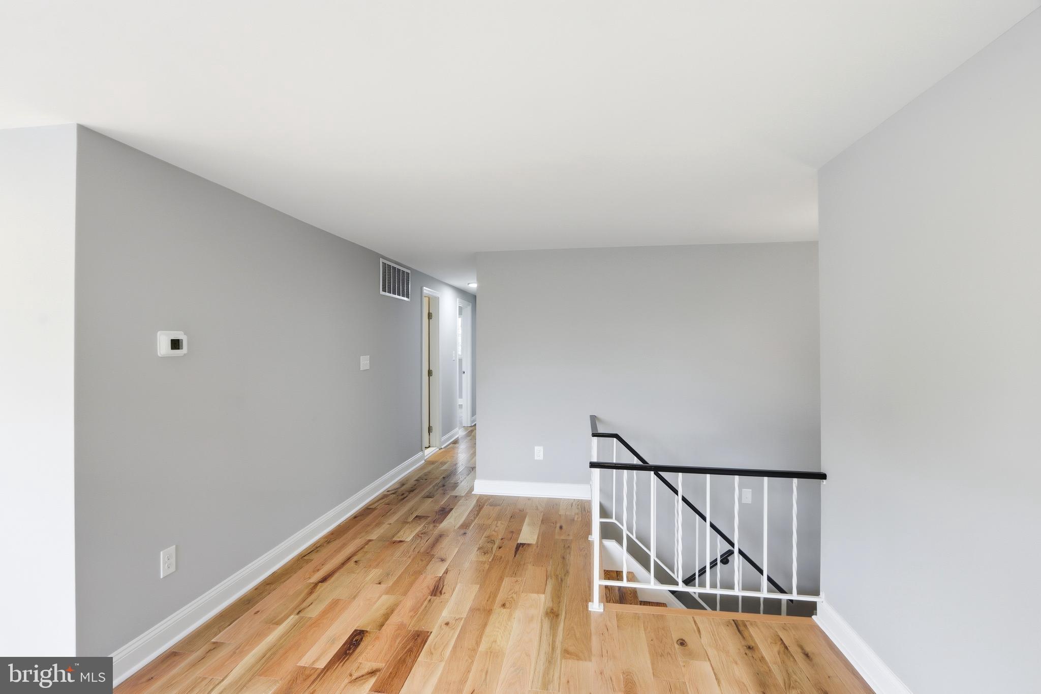 5006 Shelbourne Road Halethorpe, MD 21227 - Photo 20 of 48 a view of wooden floor in a room
