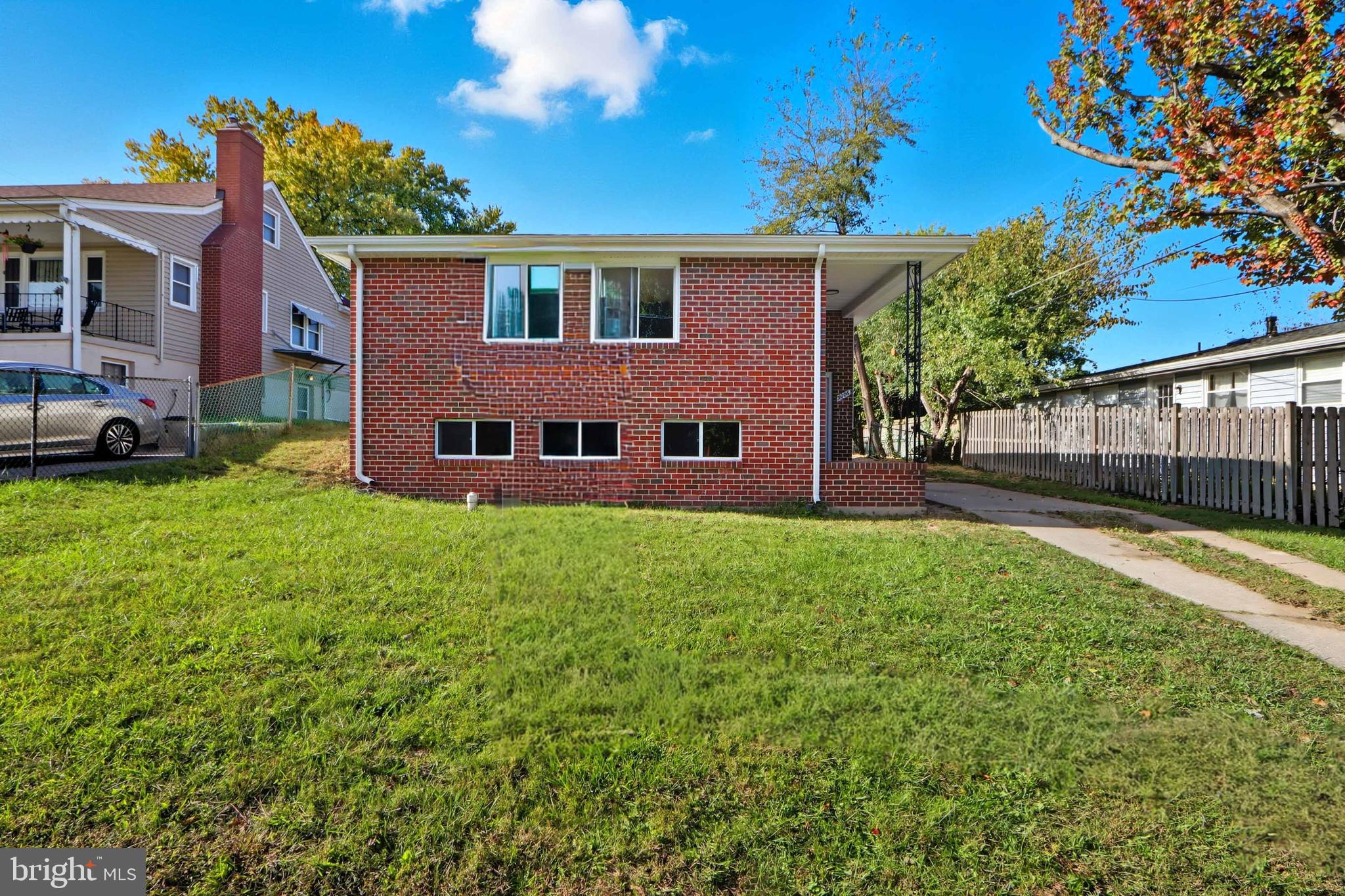 5006 Shelbourne Road Halethorpe, MD 21227 - Photo 3 of 48 a view of an house with backyard space and balcony