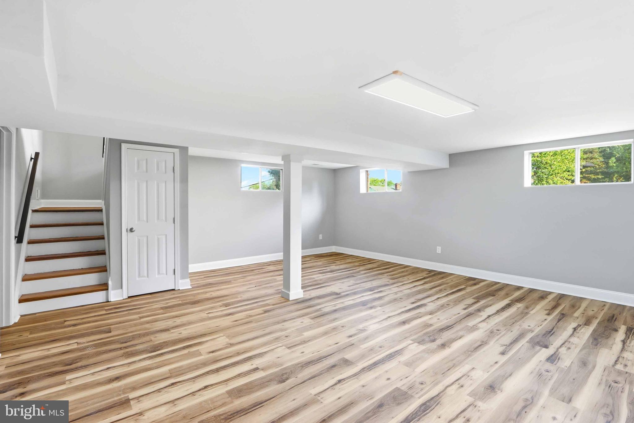 5006 Shelbourne Road Halethorpe, MD 21227 - Photo 37 of 48 wooden floor in an empty room