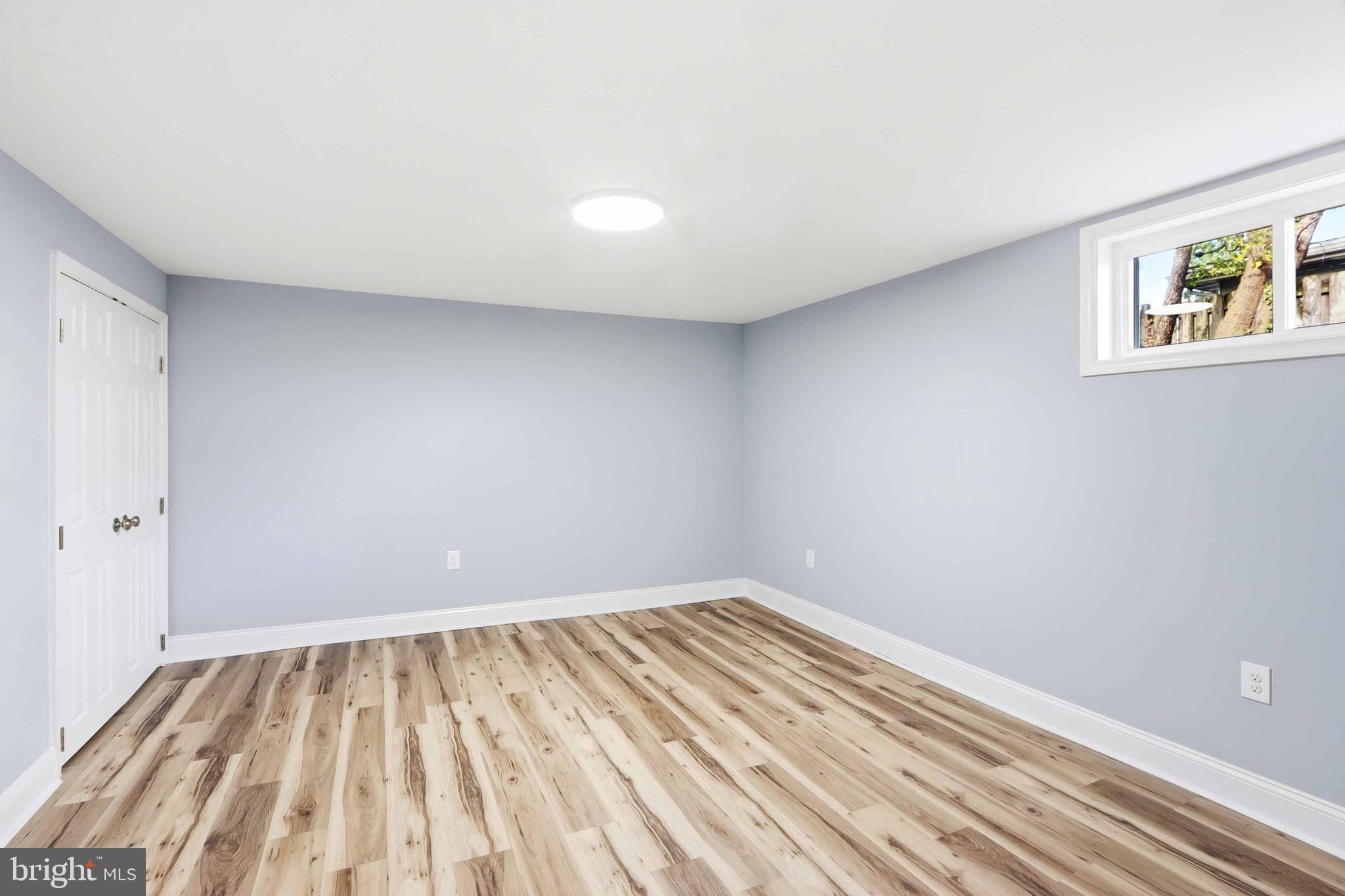 5006 Shelbourne Road Halethorpe, MD 21227 - Photo 42 of 48 wooden floor in a room