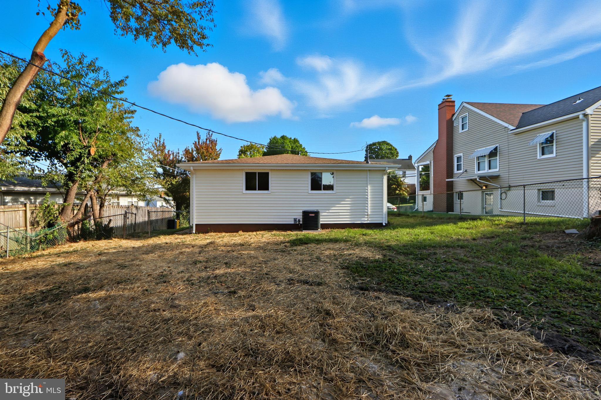 5006 Shelbourne Road Halethorpe, MD 21227 - Photo 47 of 48 a view of a house with a backyard