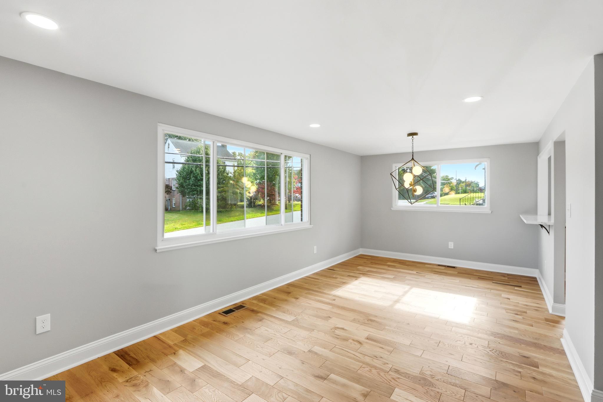 5006 Shelbourne Road Halethorpe, MD 21227 - Photo 5 of 48 a view of an empty room with a window