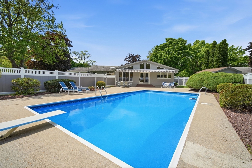 30 Birch Hill Road Northampton, MA 01062 - Photo 39 of 42 a view of a house with pool and chairs