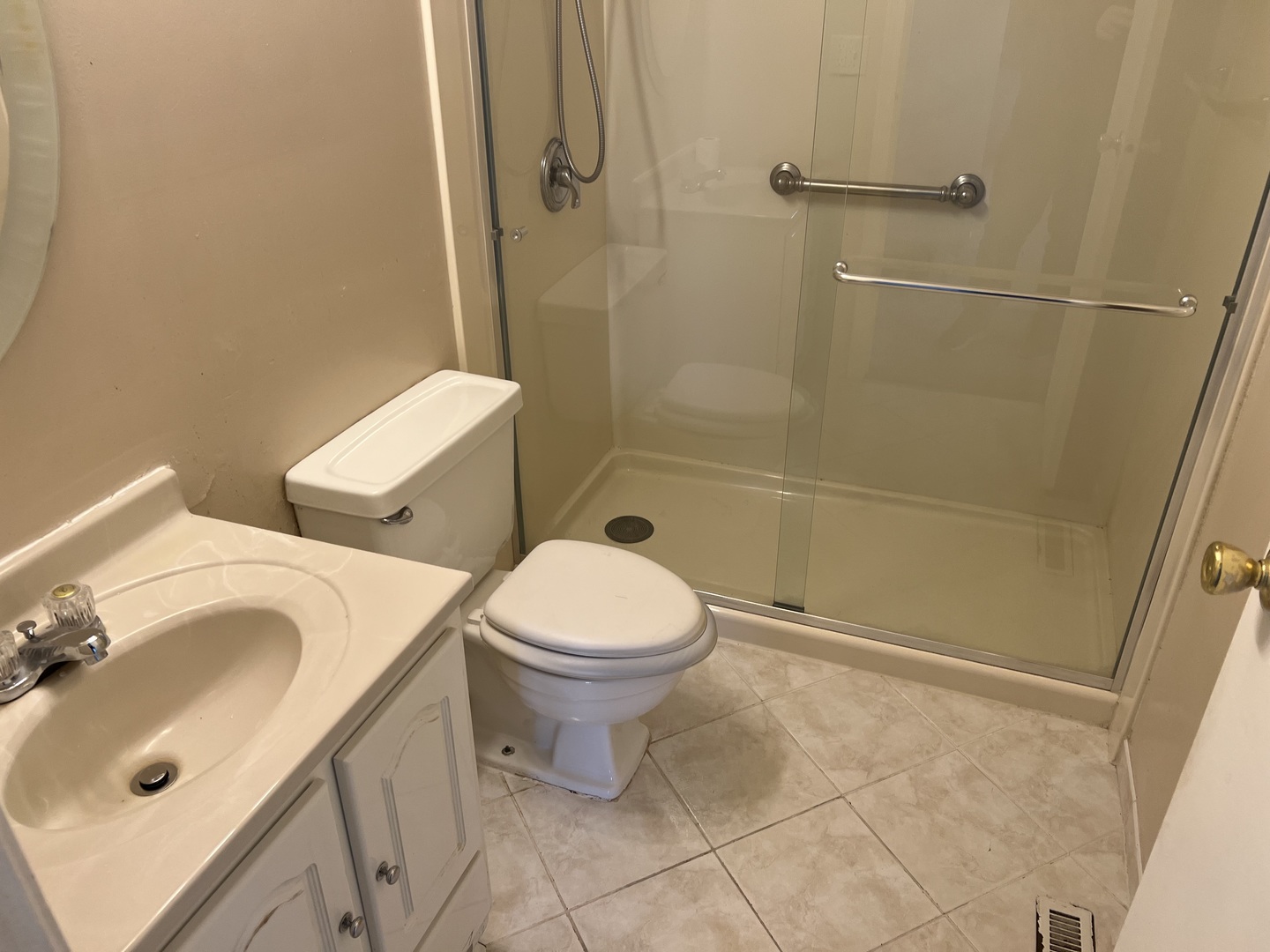 238 Algonquin Court, Unit D Bolingbrook, IL 60440 - Photo 13 of 13 a bathroom with a sink a toilet and shower