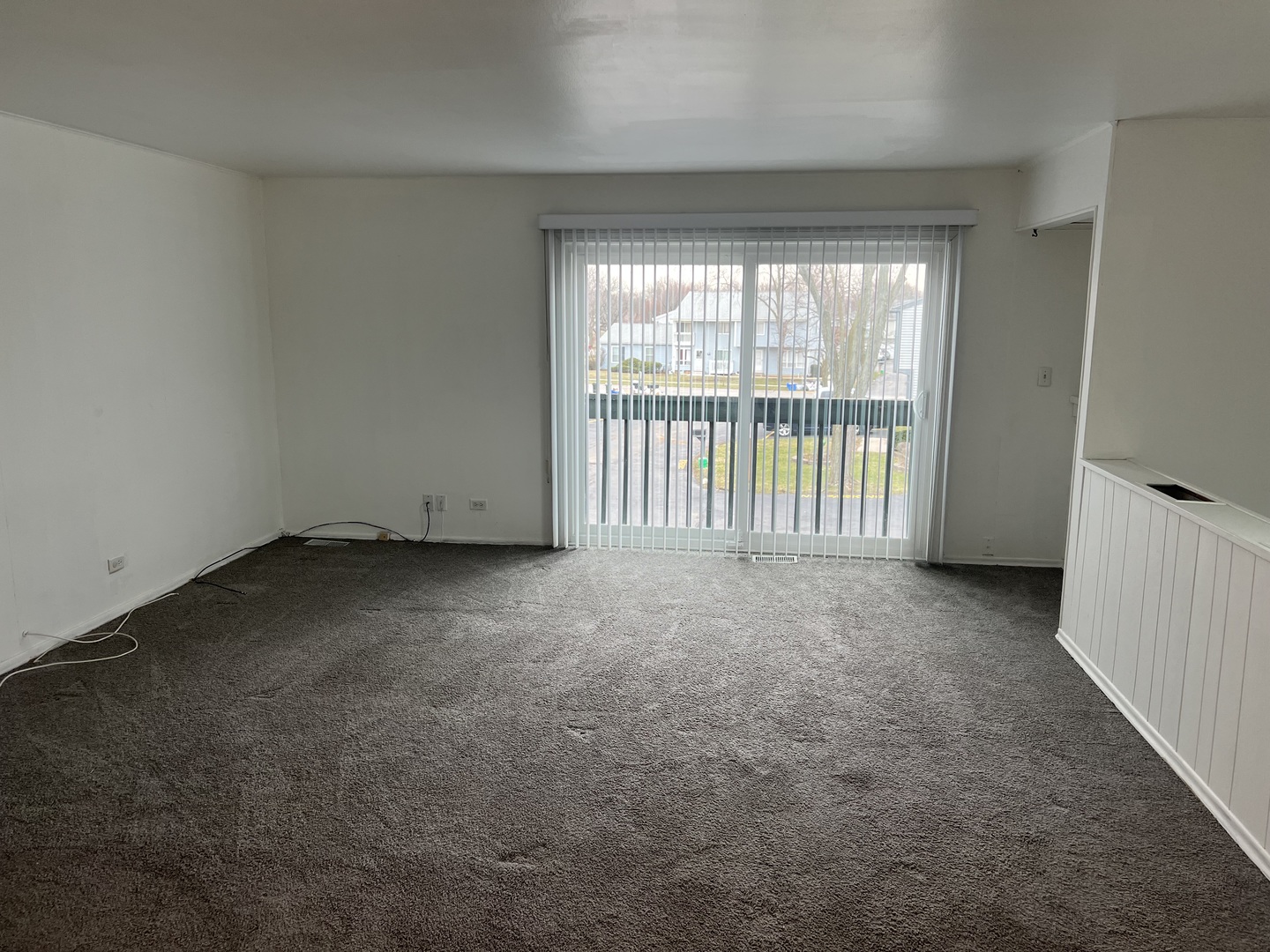 238 Algonquin Court, Unit D Bolingbrook, IL 60440 - Photo 2 of 13 a view of an empty room with a window