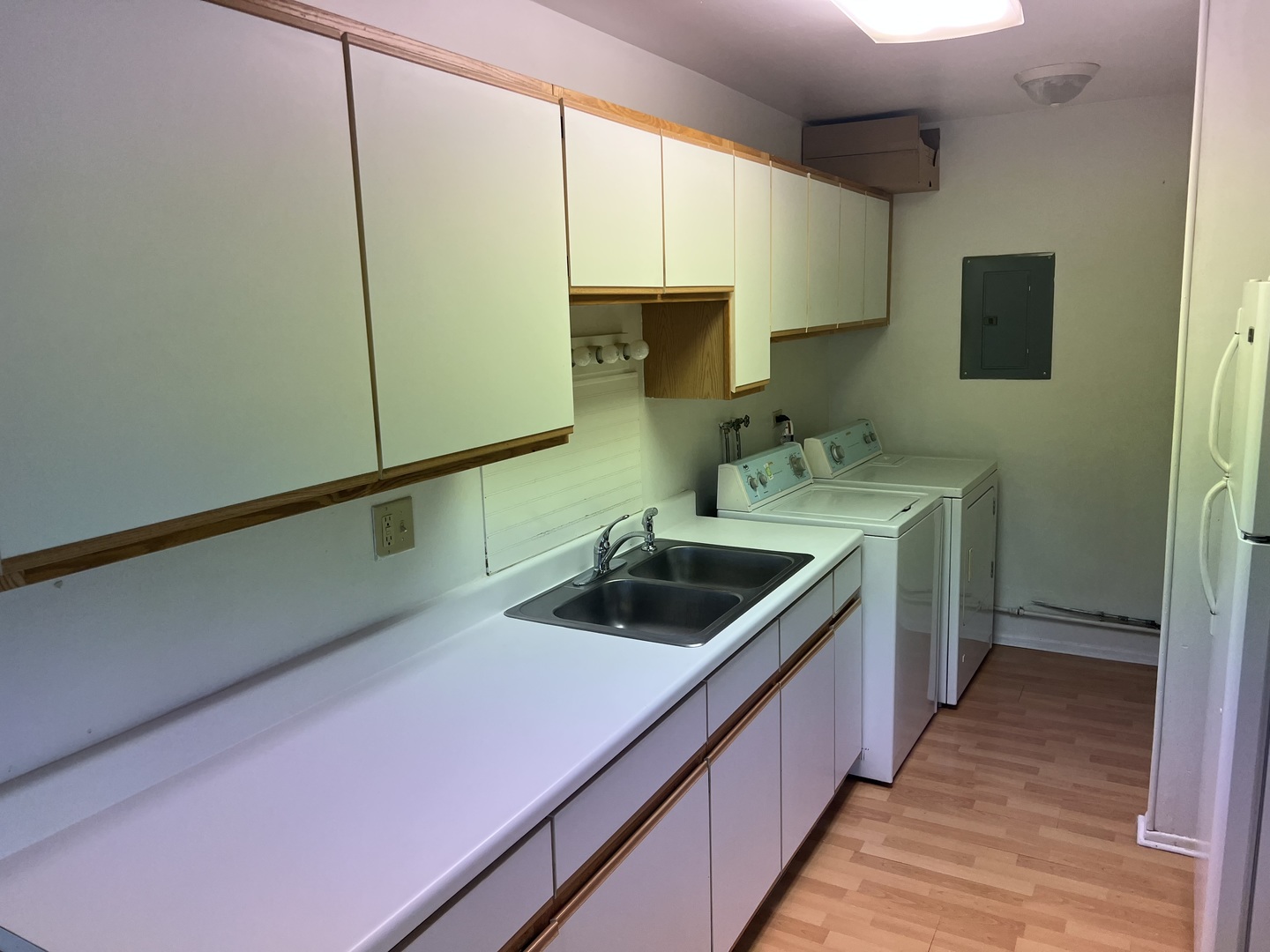 238 Algonquin Court, Unit D Bolingbrook, IL 60440 - Photo 5 of 13 a kitchen with a sink a stove and cabinets