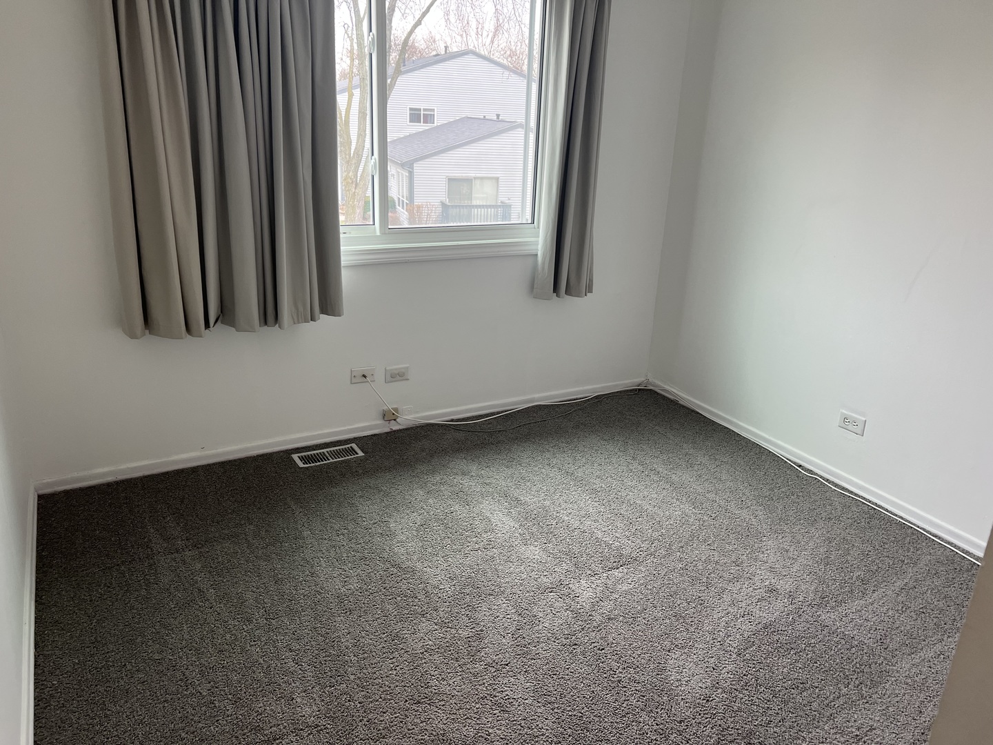 238 Algonquin Court, Unit D Bolingbrook, IL 60440 - Photo 9 of 13 an empty room with a window