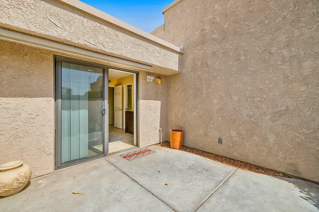 a view of a brick house with bathroom
