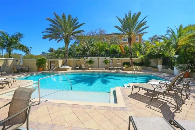 a view of a backyard with a patio