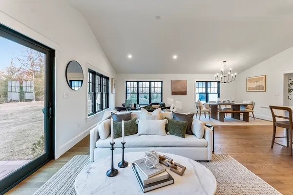 a spacious bedroom with a bed and window