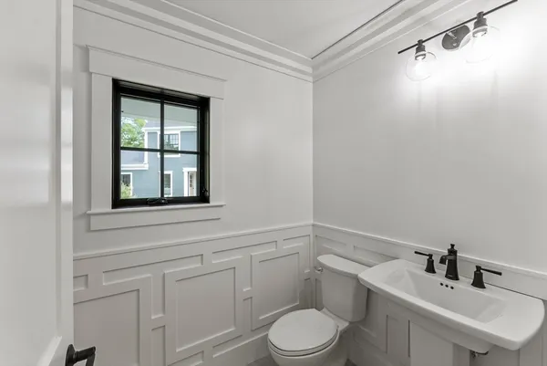 a bathroom with a sink and a toilet