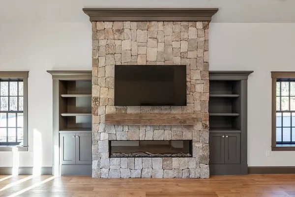 a view of house with yard and green space