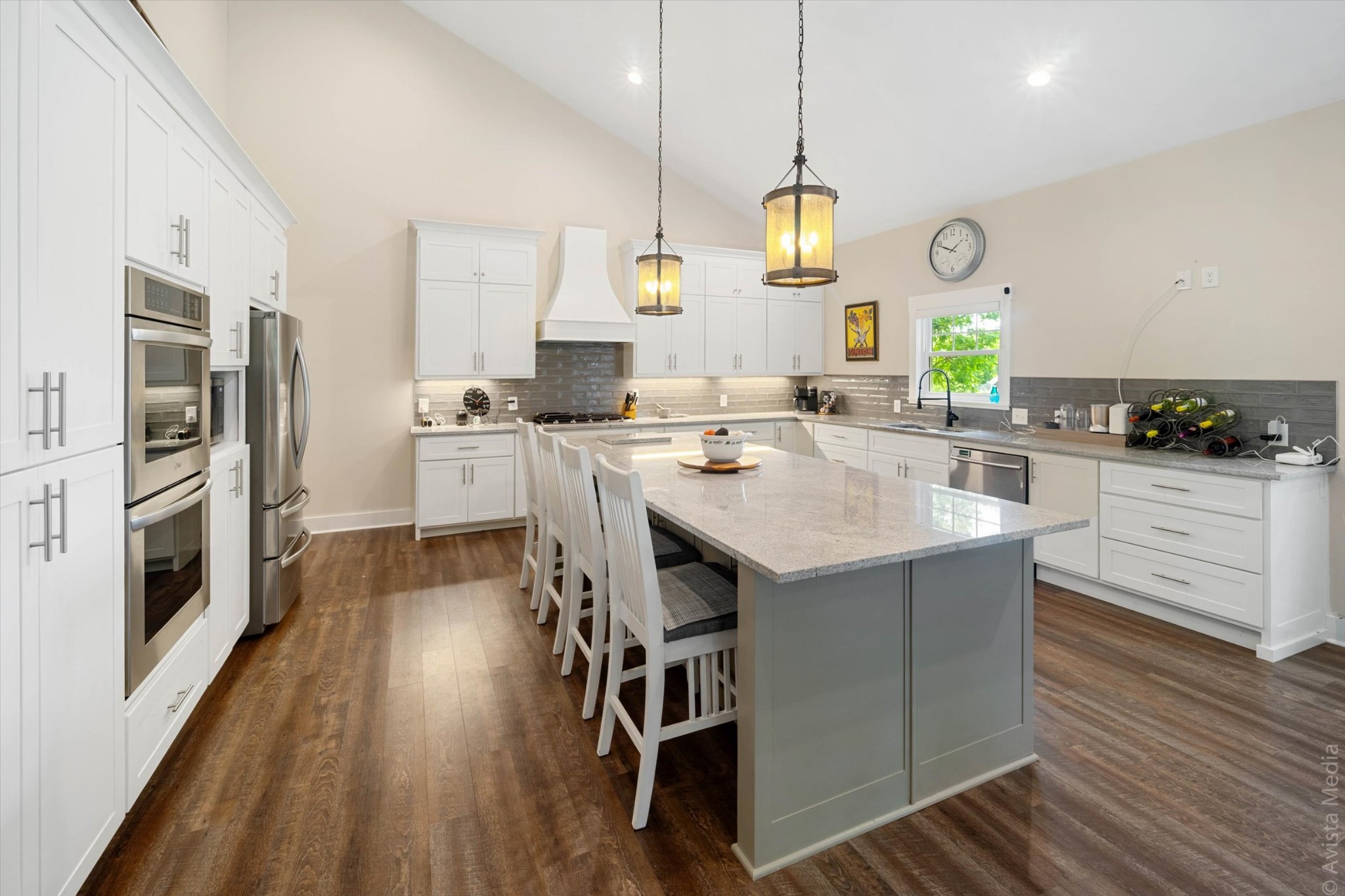 2600 Cooks Road Mount Juliet, TN 37122 - Photo 14 of 40 a kitchen with stainless steel appliances a stove a sink dishwasher a refrigerator and a fireplace with wooden floor