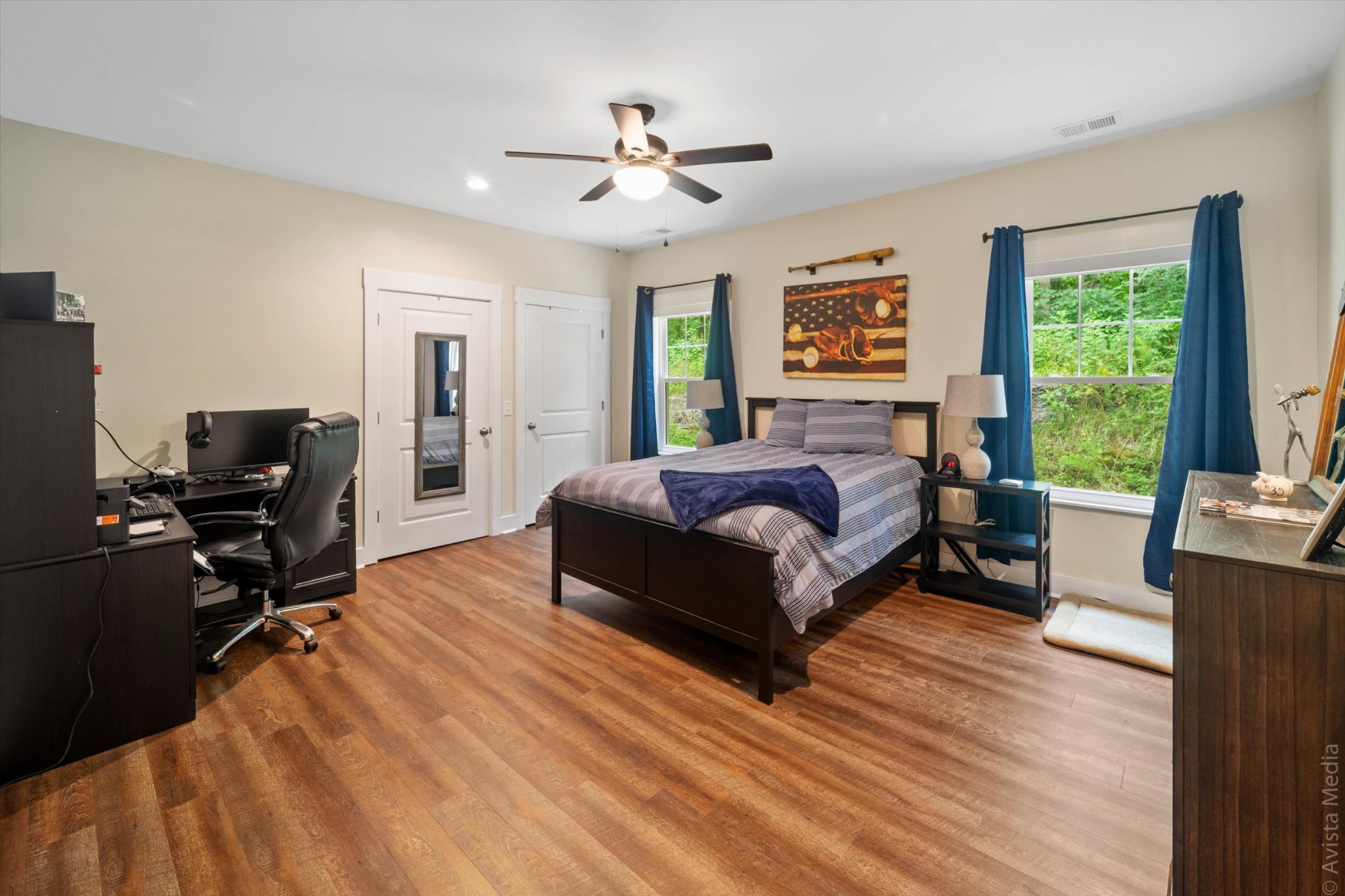 2600 Cooks Road Mount Juliet, TN 37122 - Photo 25 of 40 a living room with a bed furniture and a flat screen tv