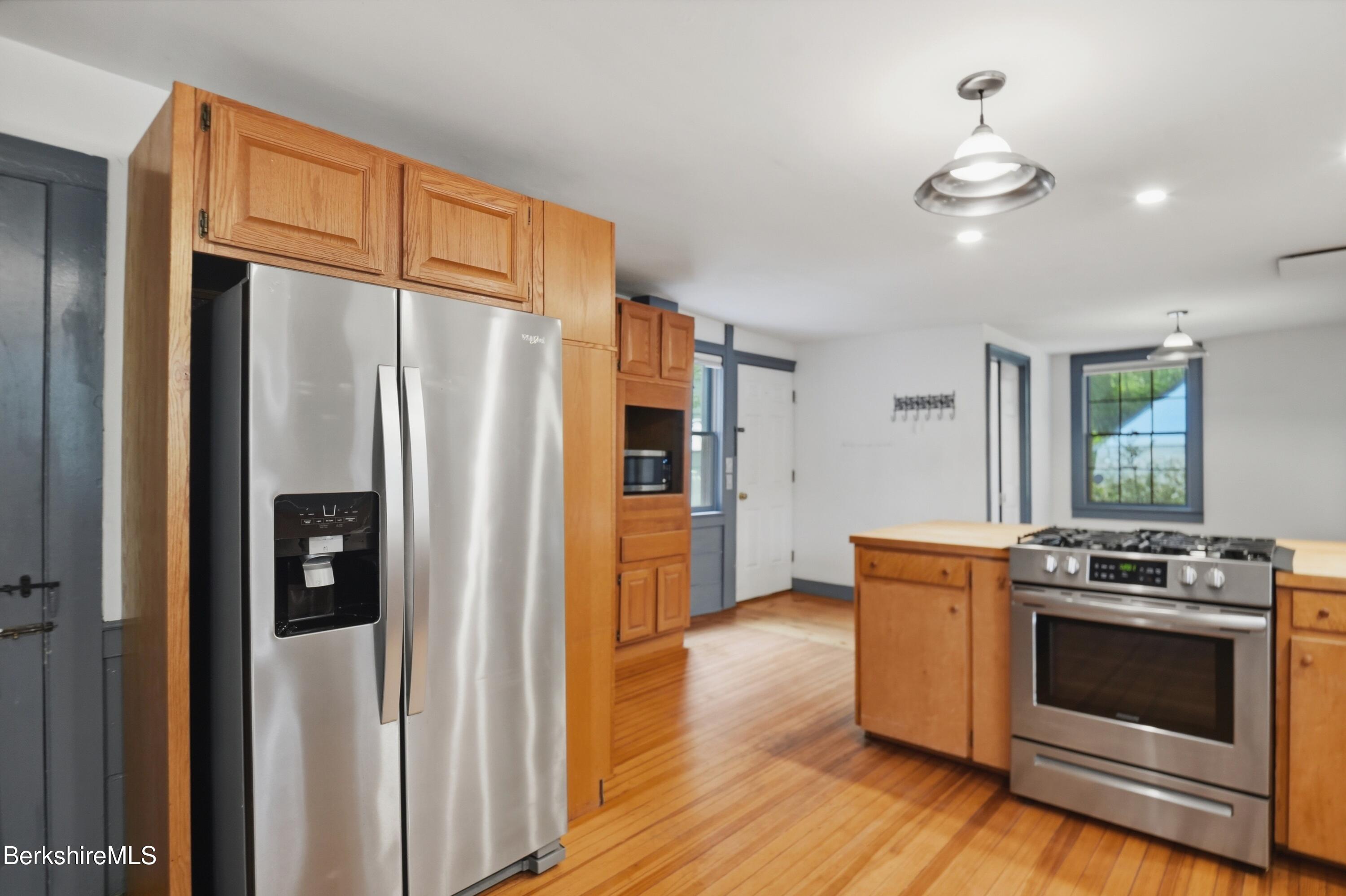 4 Stockbridge Road West Stockbridge, MA 01266 - Photo 31 of 94 a kitchen with stainless steel appliances granite countertop a refrigerator and a stove top oven