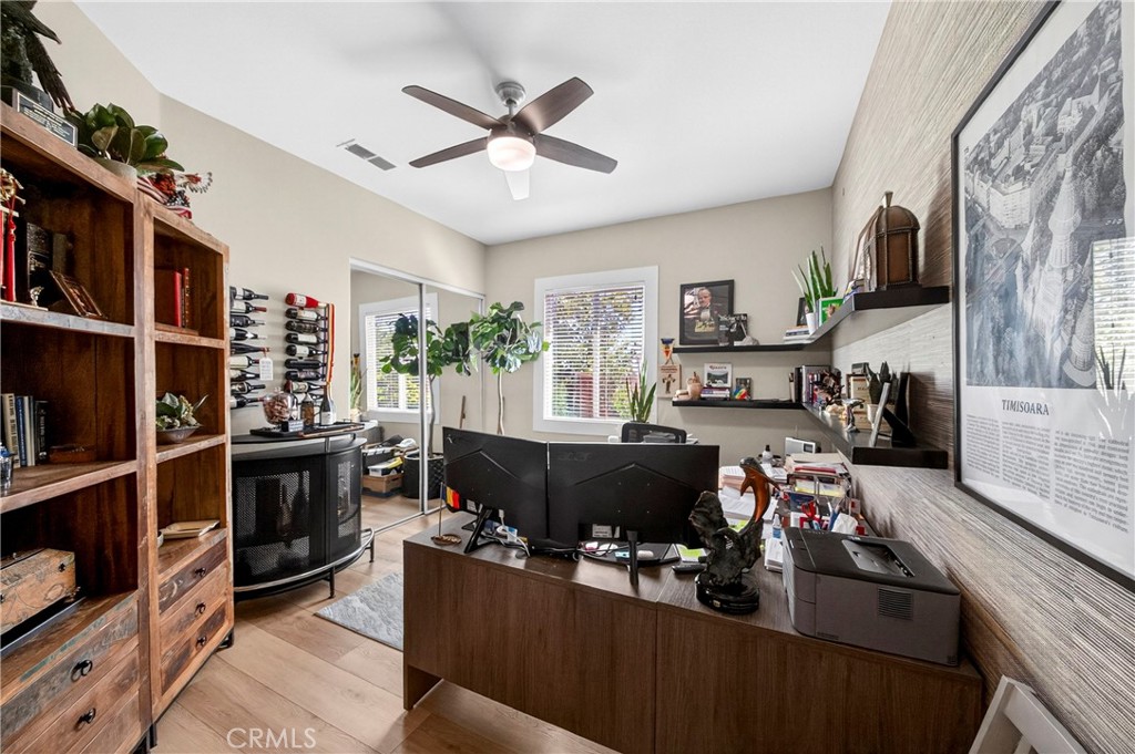 16375 Ory Circle Riverside, CA 92503 - Photo 36 of 51 a living room with furniture a flat screen tv and a fireplace