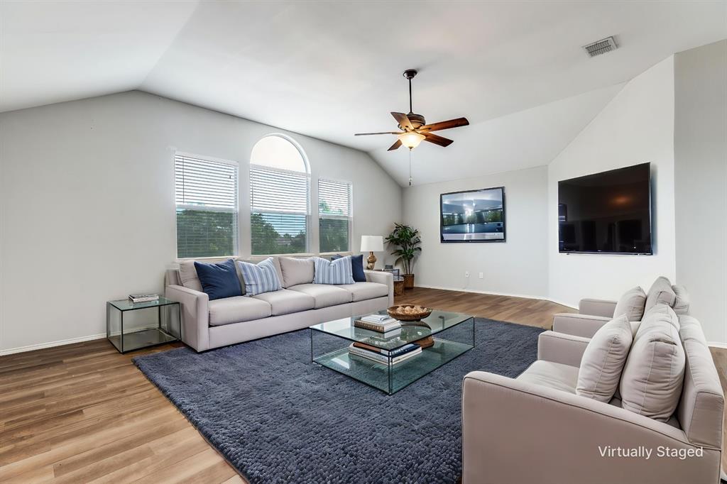 1445 Berkley Road Allen, TX 75002 - Photo 19 of 30 The LARGE game room upstairs is located above the garage and provides an abundance of space and flexibility for all kinds of fun! Think, man cave, craft space, exercise room...the sky is the limit here!