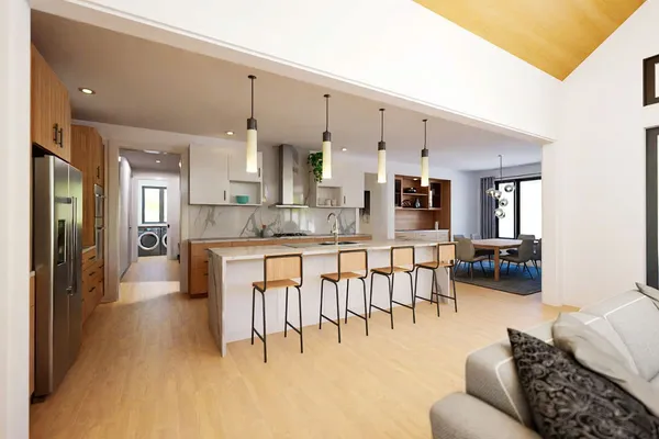 a living room with stainless steel appliances kitchen island granite countertop furniture and a kitchen view