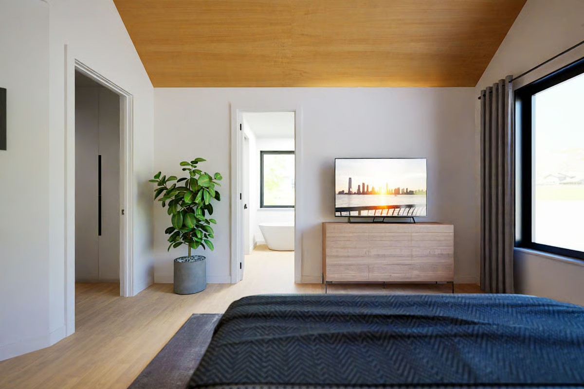 2004 Ballinger Drive Spicewood, TX 78669 - Photo 13 of 30 Primary Suite with vaulted wood ceiling, large picture window, and a spa-like ensuite bathroom.