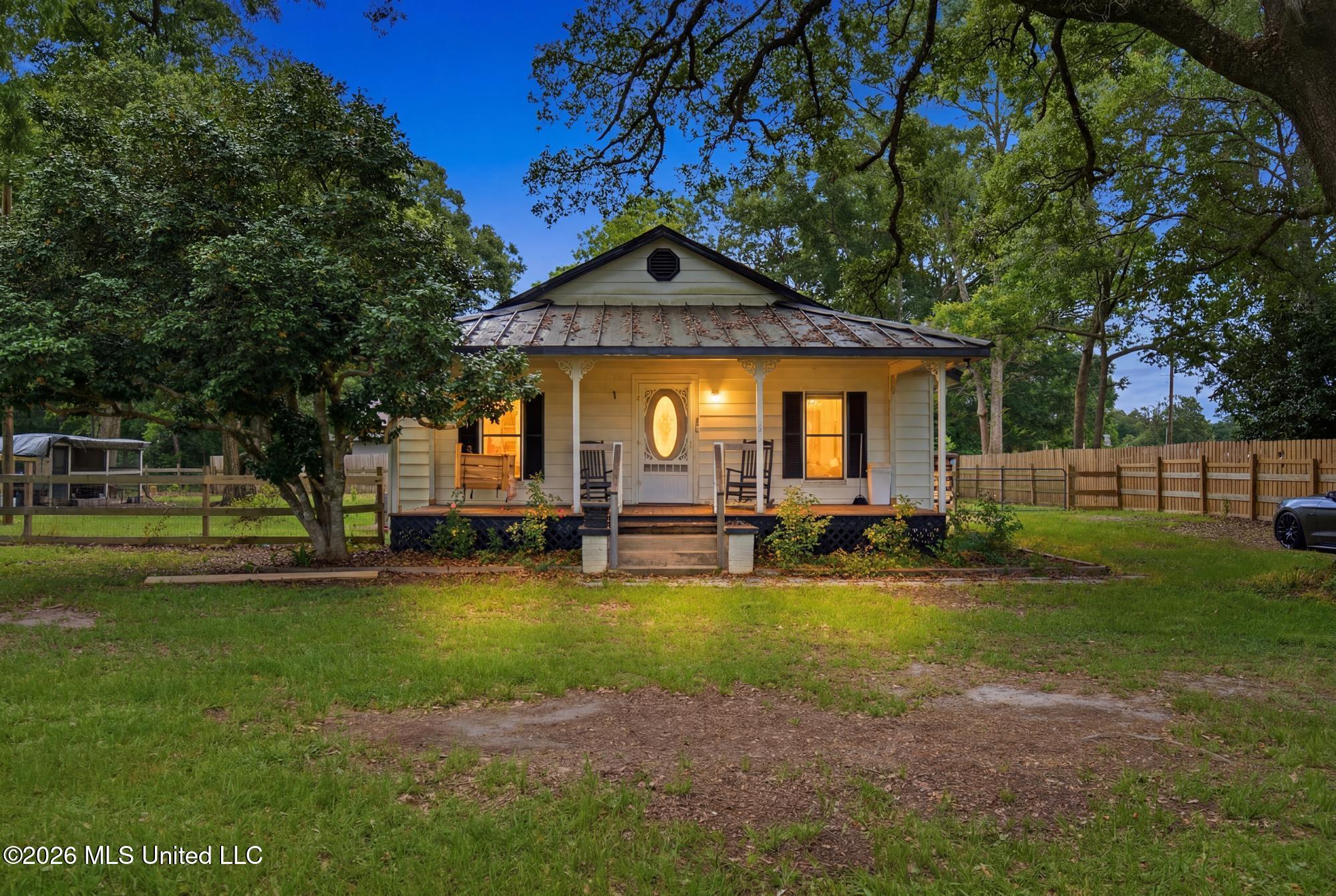 1230 Weeks Road Lucedale, MS 39452 - Photo 1 of 36 1_dsc00755_twilight_9a0123e7