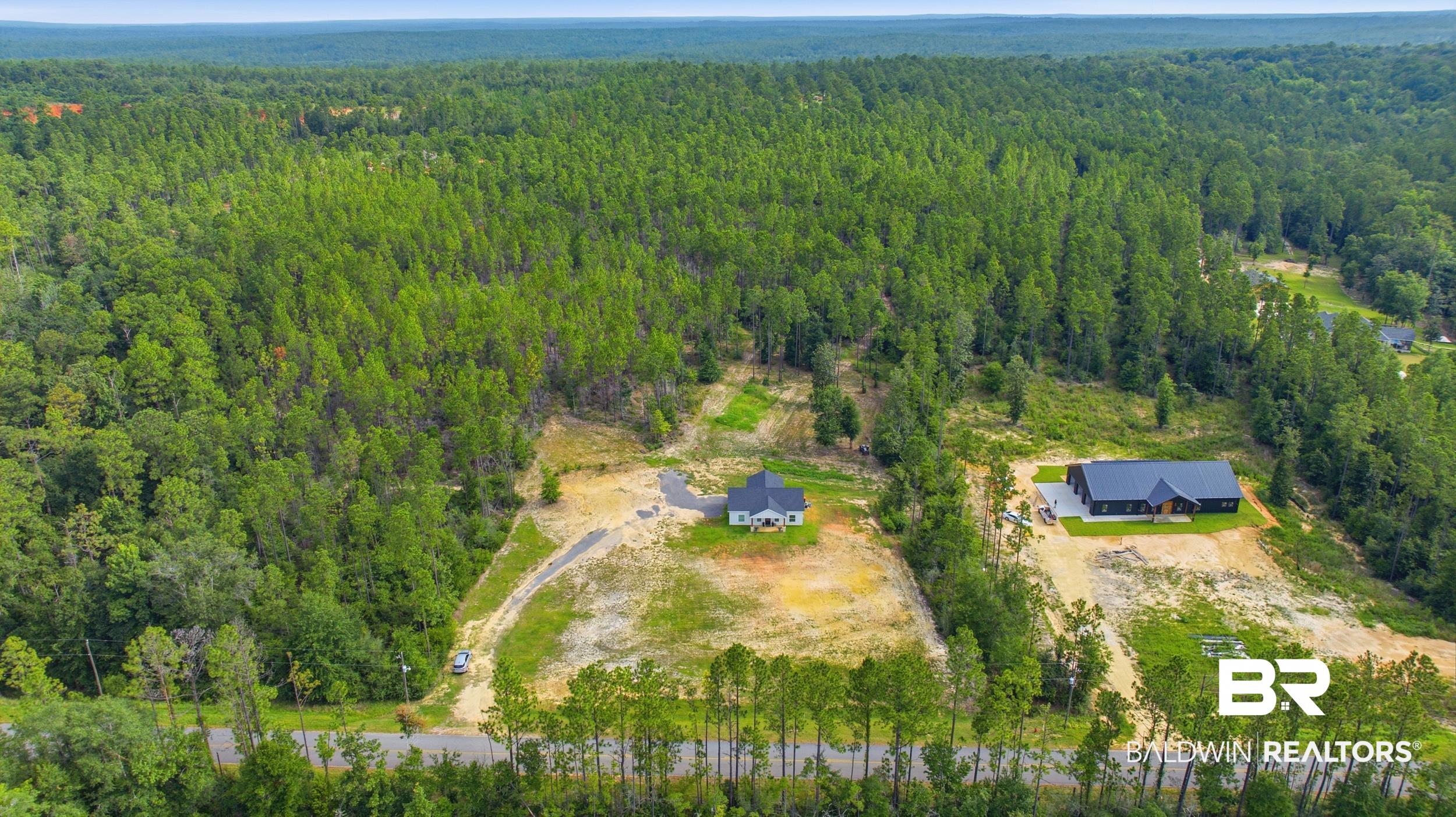 12019 Red Hill Rd Extension Bay Minette, AL 36507 - Photo 44 of 48 Expansive wooded acreage featuring two distinct residential structures