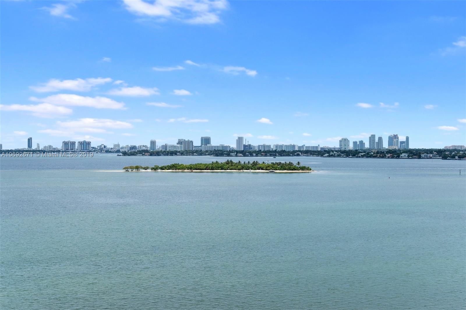 665 Northeast 25th Street, Unit 802 Miami, FL 33137 - Photo 16 of 24 a view of a lake with a city view