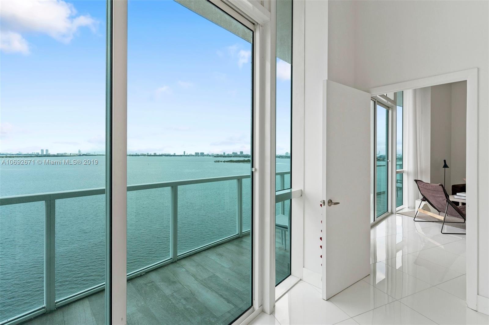 665 Northeast 25th Street, Unit 802 Miami, FL 33137 - Photo 4 of 24 a view of a bathroom from a hallway