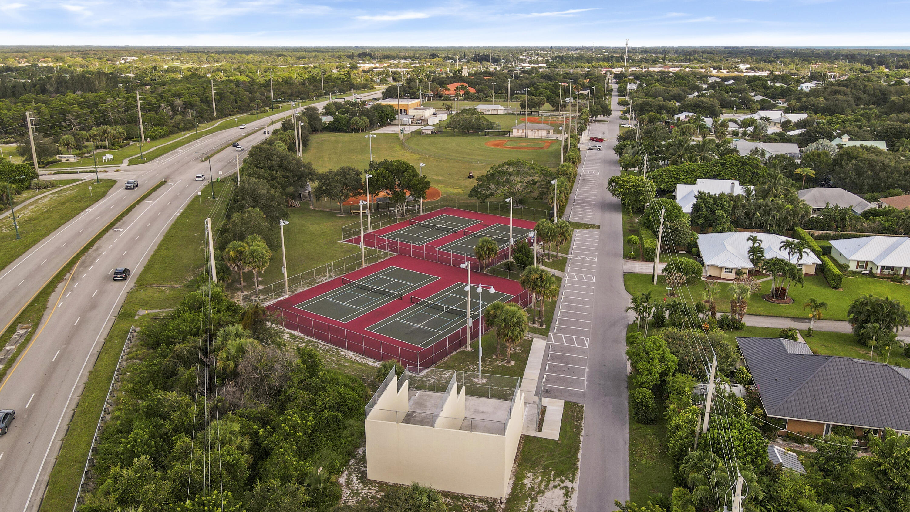 9155 Southeast Athena Street Hobe Sound, FL 33455 - Photo 25 of 25 an aerial view of residential houses with outdoor space and river