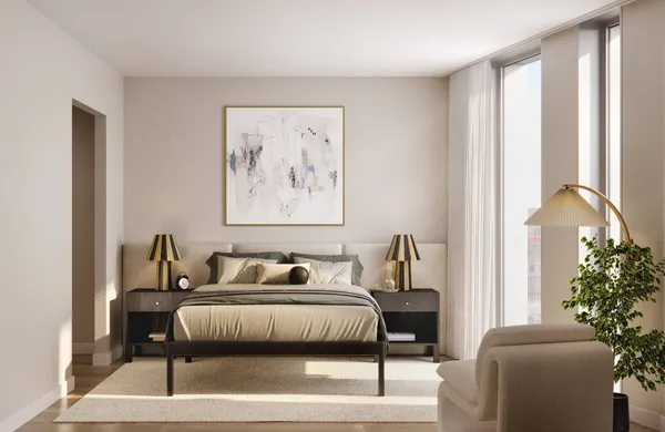 a bedroom with furniture and a window