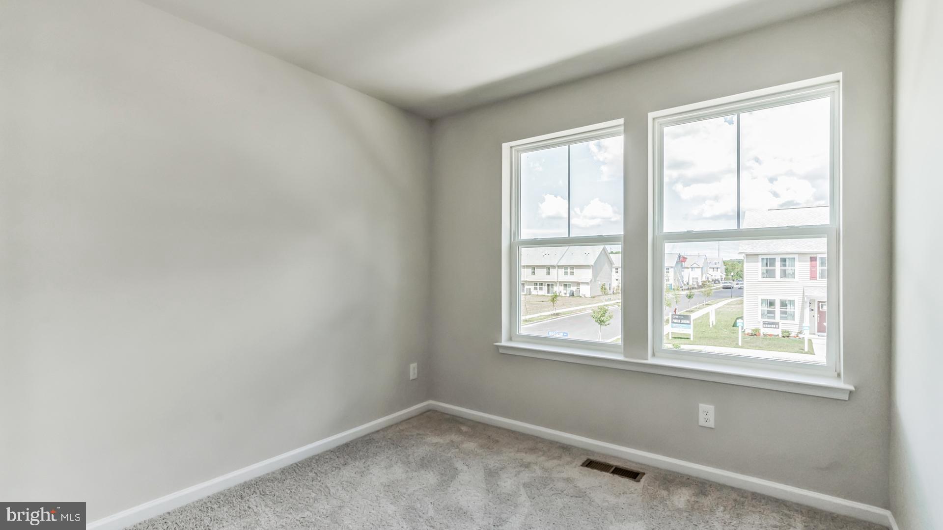 601 Widgeon Way Cambridge, MD 21613 - Photo 11 of 17 an empty room with a window