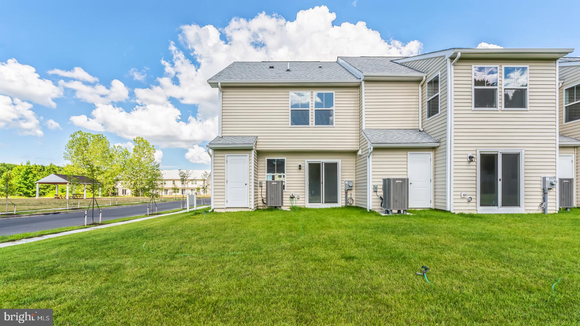 601 Widgeon Way Cambridge, MD 21613 - Photo 15 of 17 a front view of a house with a yard