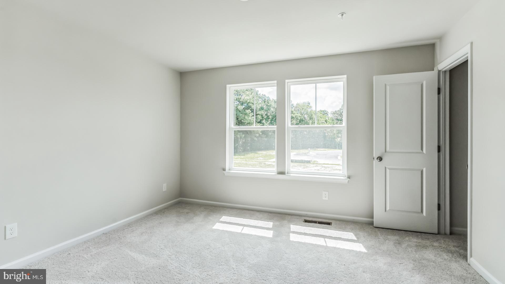 601 Widgeon Way Cambridge, MD 21613 - Photo 7 of 17 a view of an empty room with a window