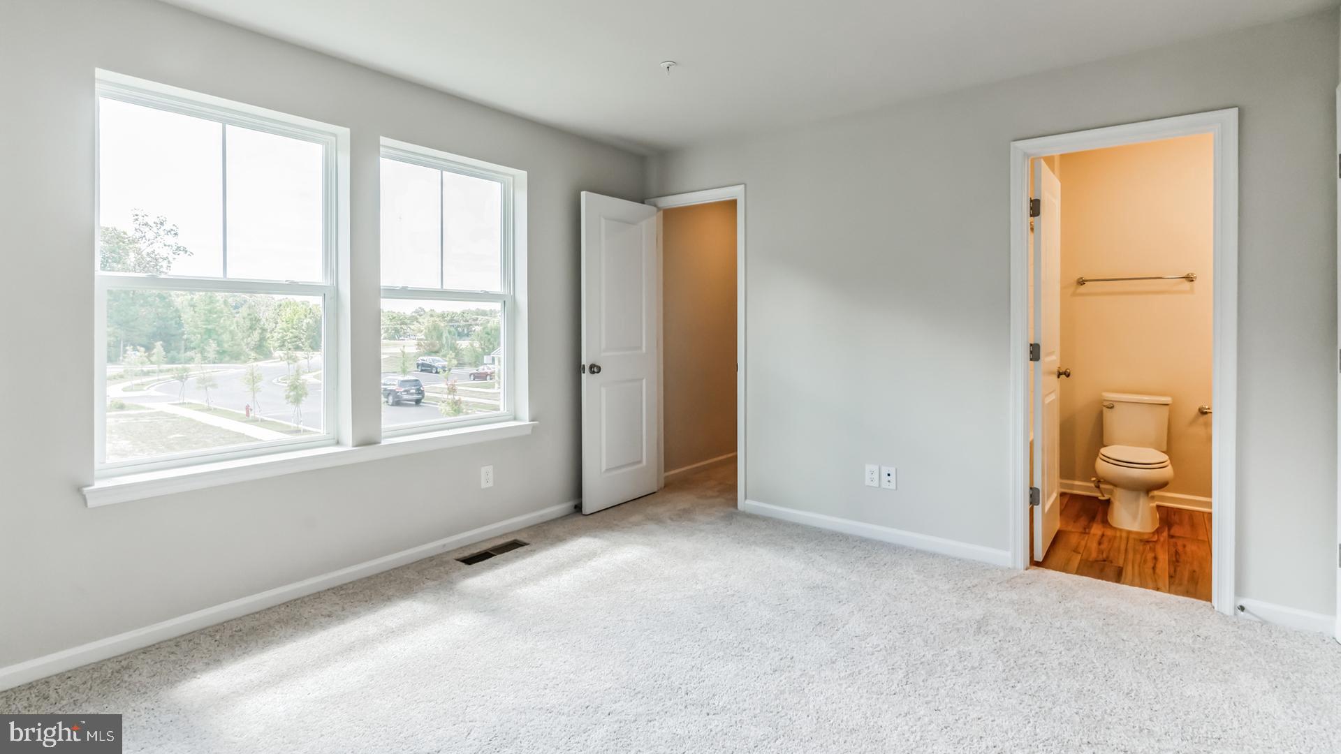 601 Widgeon Way Cambridge, MD 21613 - Photo 8 of 17 a view of an empty room with a window