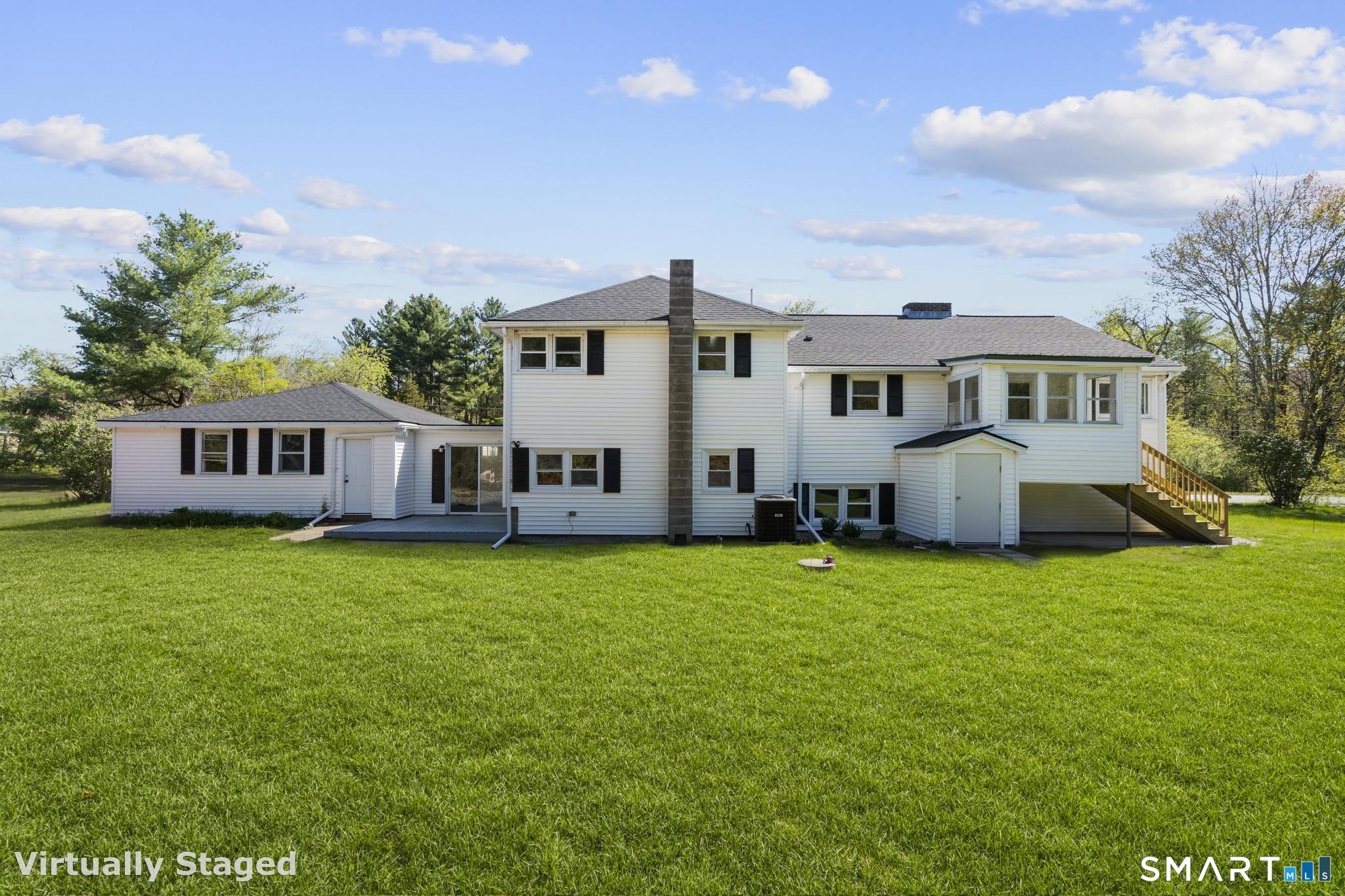 26 Quaddick Town Farm Road Thompson, CT 06277 - Photo 2 of 32 a view of a house with a yard