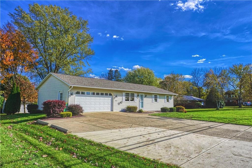 403 Meridian Road Butler, PA 16001 - Photo 1 of 25 a front view of a house with a yard