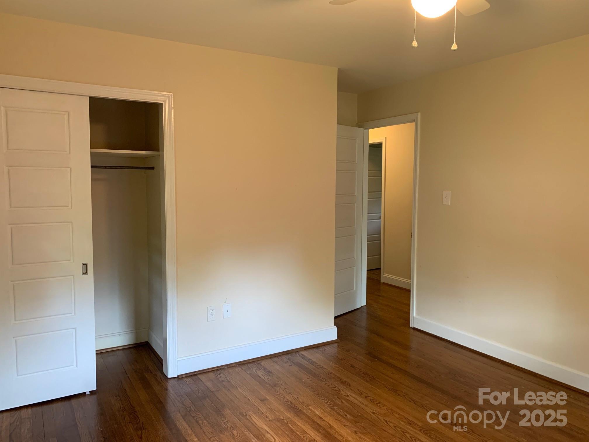 422 Fieldstone Road Mooresville, NC 28115 - Photo 20 of 30 an empty room with wooden floor and closet
