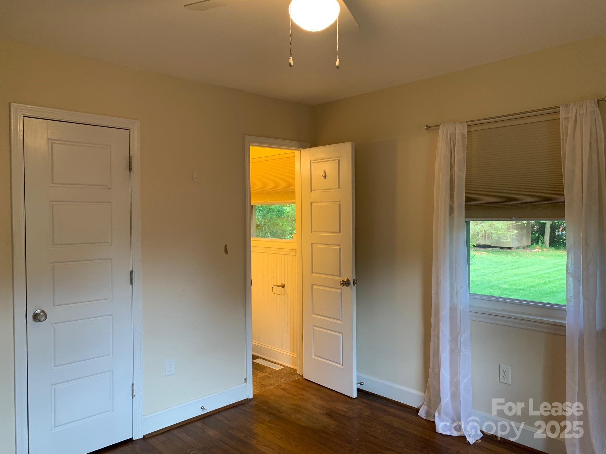 422 Fieldstone Road Mooresville, NC 28115 - Photo 23 of 30 wooden floor in an empty room with a window