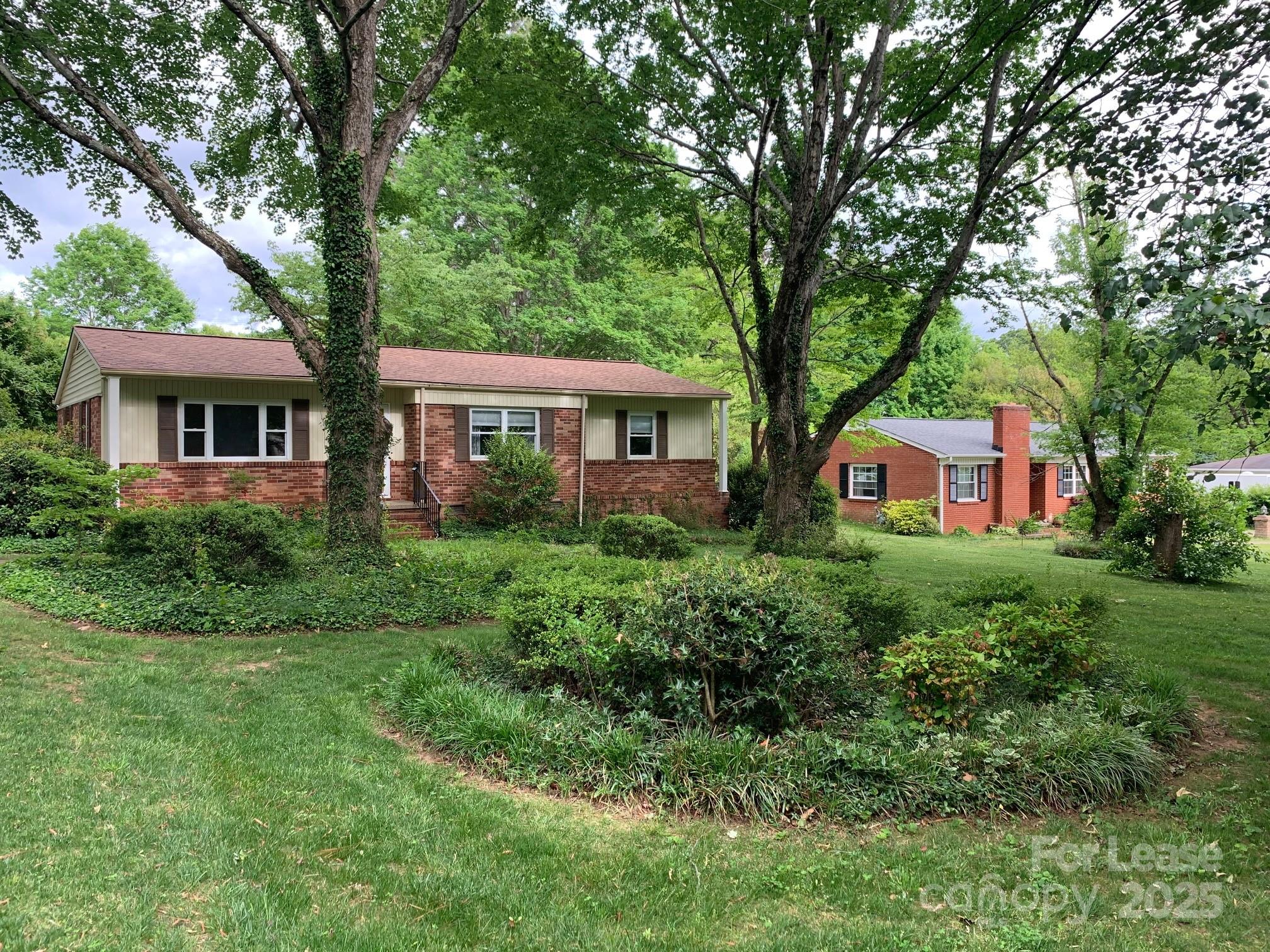 422 Fieldstone Road Mooresville, NC 28115 - Photo 3 of 30 a front view of house with yard and green space
