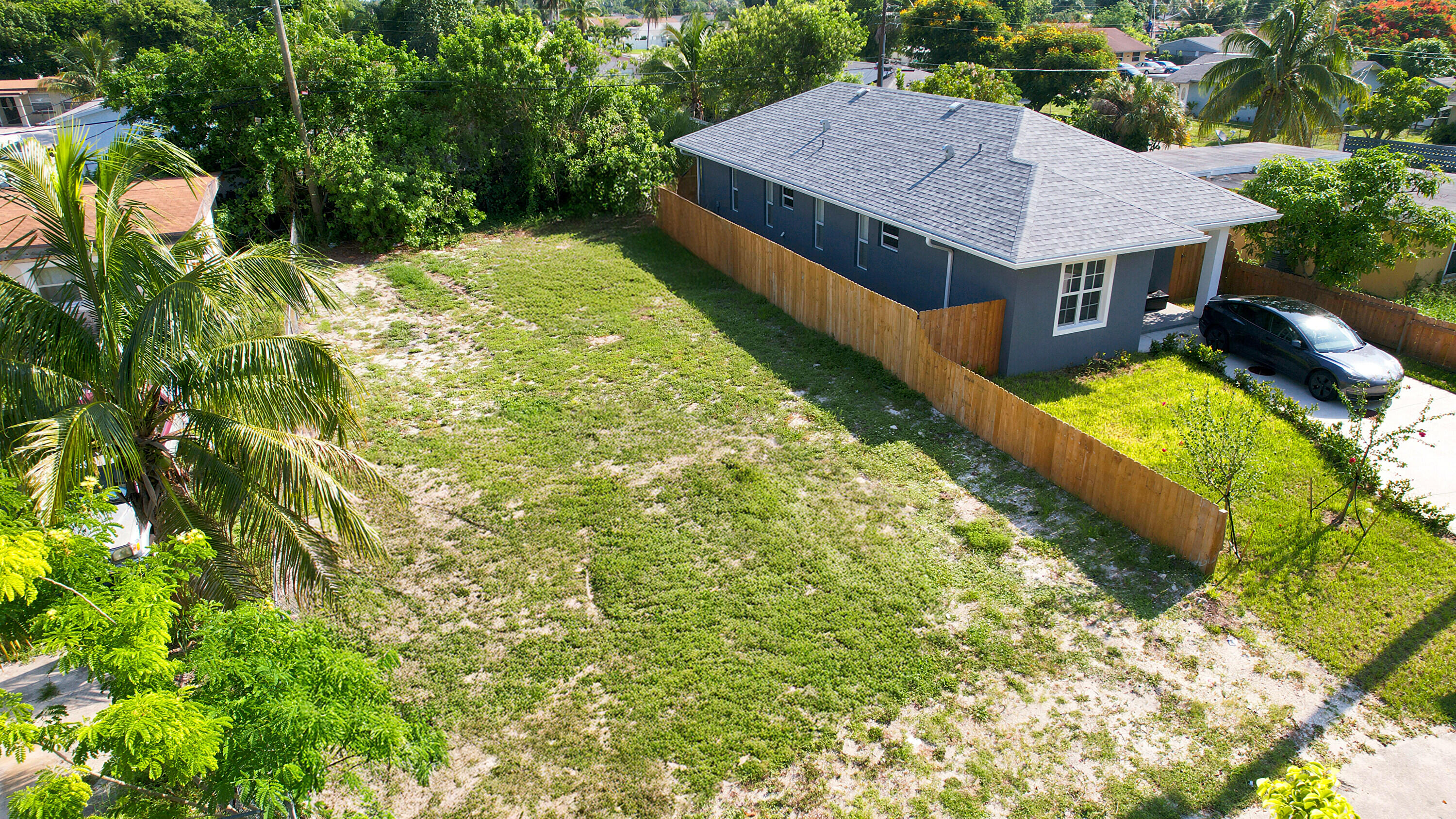 1141 Peak Road Lake Worth, FL 33462 - Photo 2 of 16 02_002_dji_0059