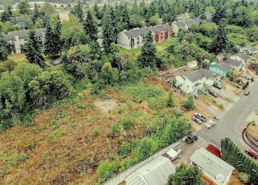 an aerial view of residential house with parking space