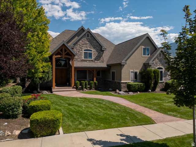 687 South 2080th Street East Springville, UT 84663 - Photo 67 of 149 Stone and stucco exterior with multiple gables and a prominent wood-beamed entryway
