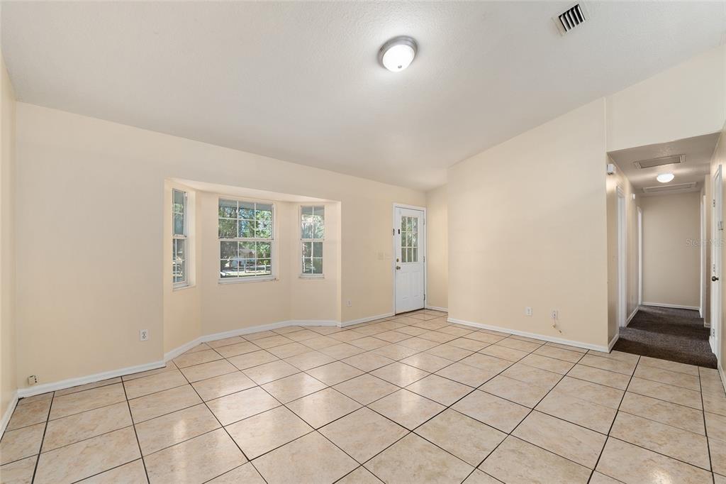 4329 Northwest 155th Street Reddick, FL 32686 - Photo 16 of 52 a view of an empty room and window