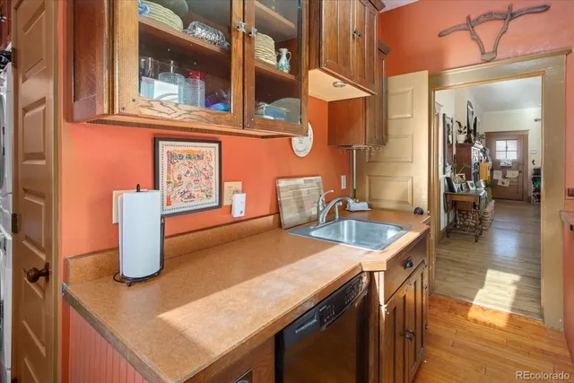 a kitchen with a table and chairs