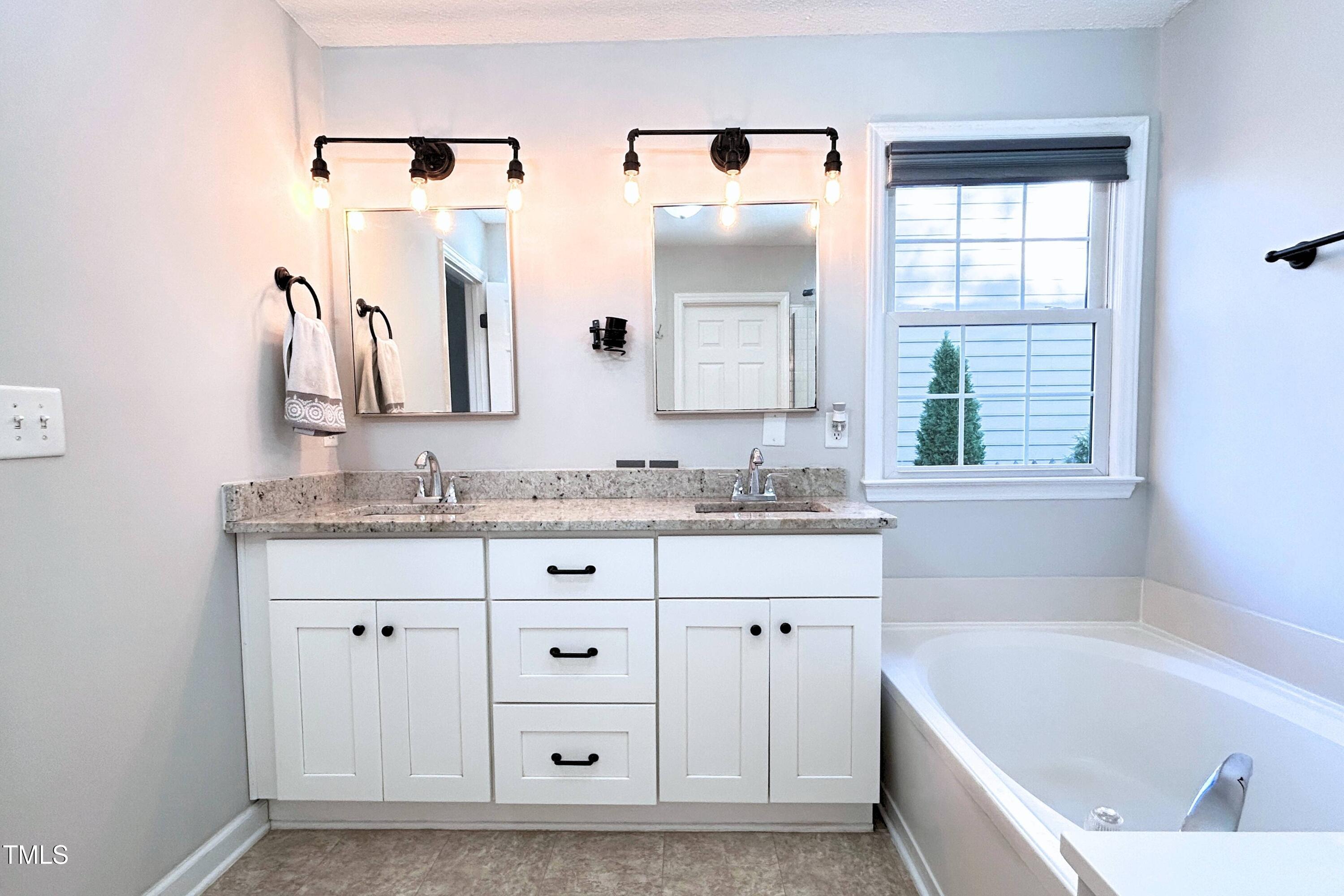 5824 Edgebury Road Raleigh, NC 27613 - Photo 16 of 30 First Floor Primary Bathroom