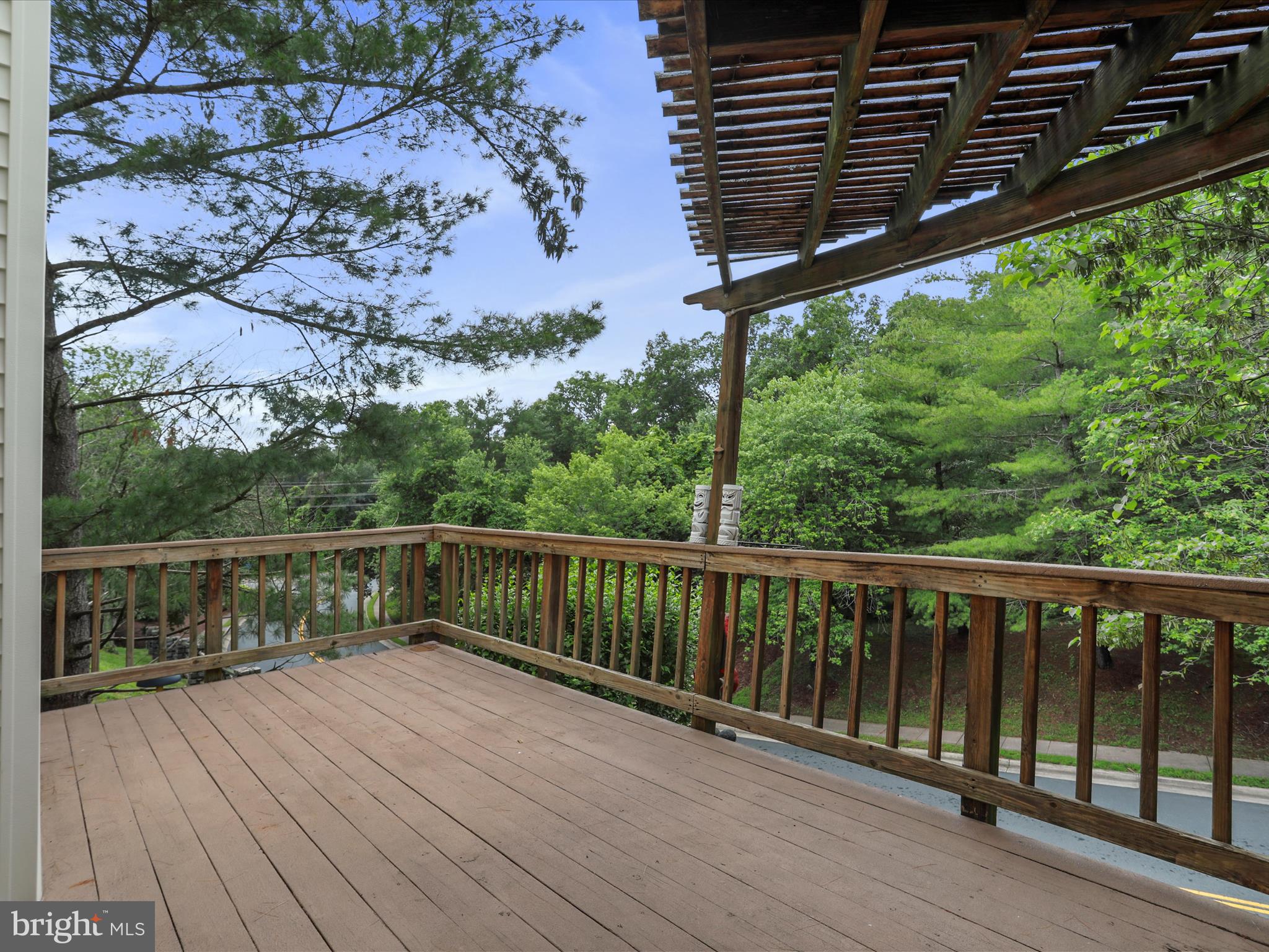 6910 Compton Valley Court Centreville, VA 20121 - Photo 15 of 37 a balcony with wooden floor and fence