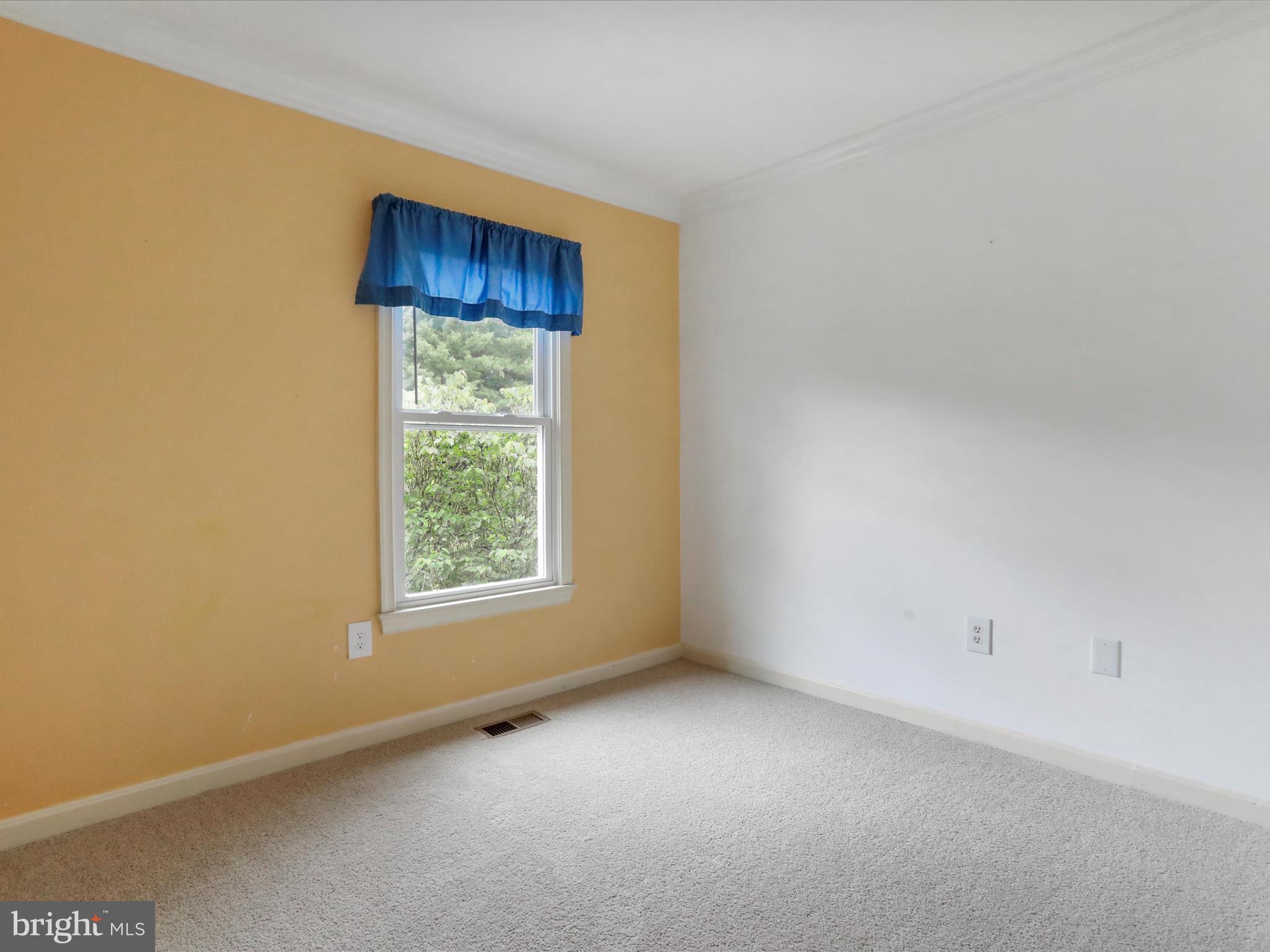 6910 Compton Valley Court Centreville, VA 20121 - Photo 21 of 37 a view of an empty room with a window