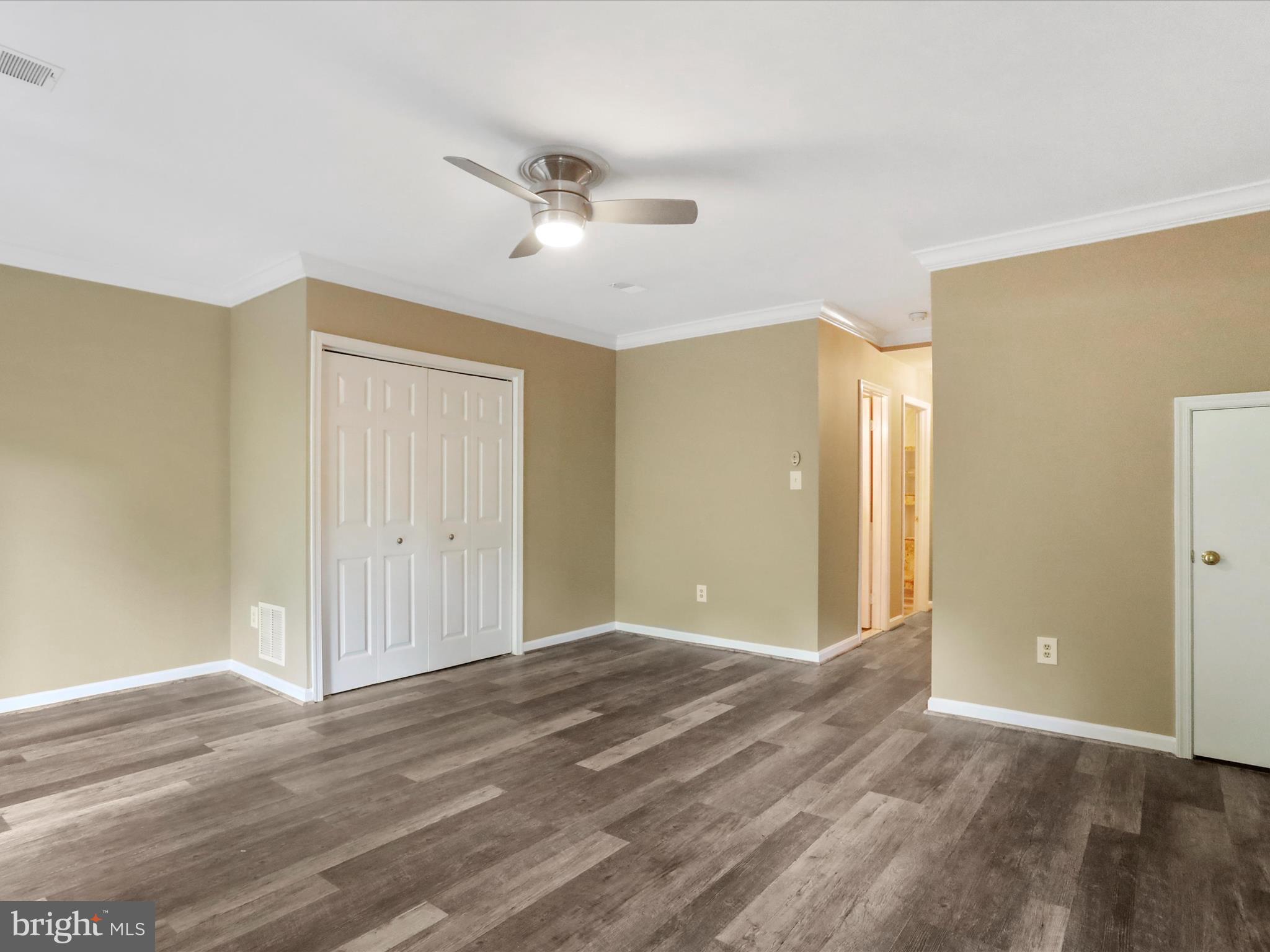 6910 Compton Valley Court Centreville, VA 20121 - Photo 34 of 37 a view of livingroom with hardwood floor and ceiling fan