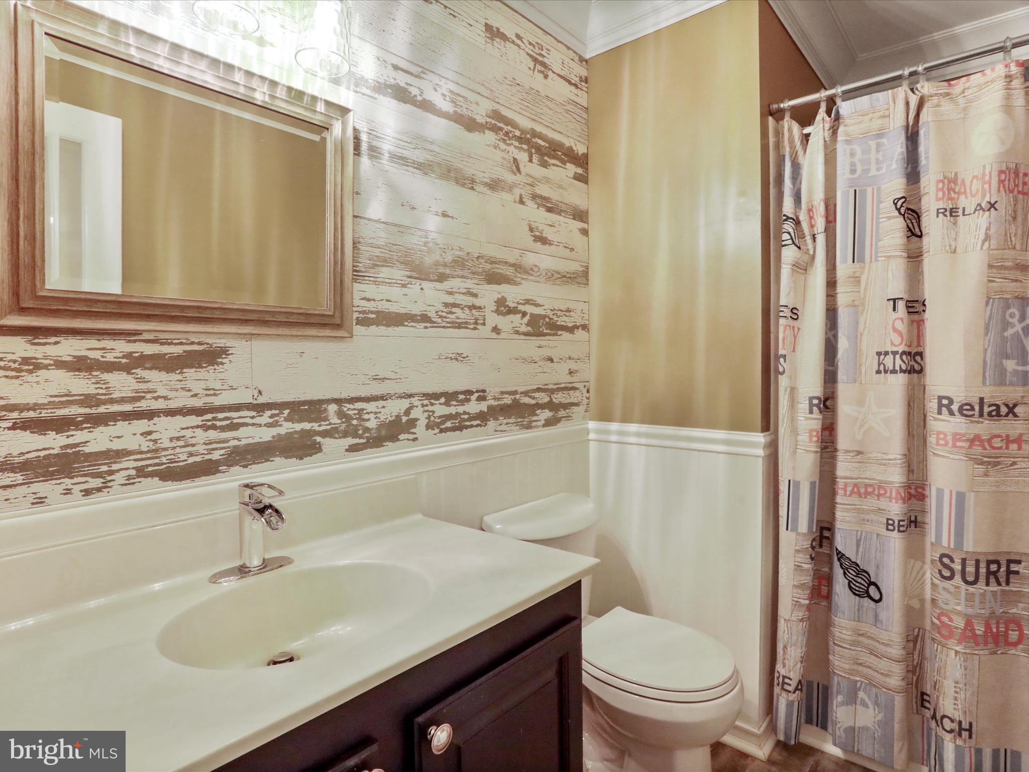 6910 Compton Valley Court Centreville, VA 20121 - Photo 36 of 37 a bathroom with a sink toilet and shower